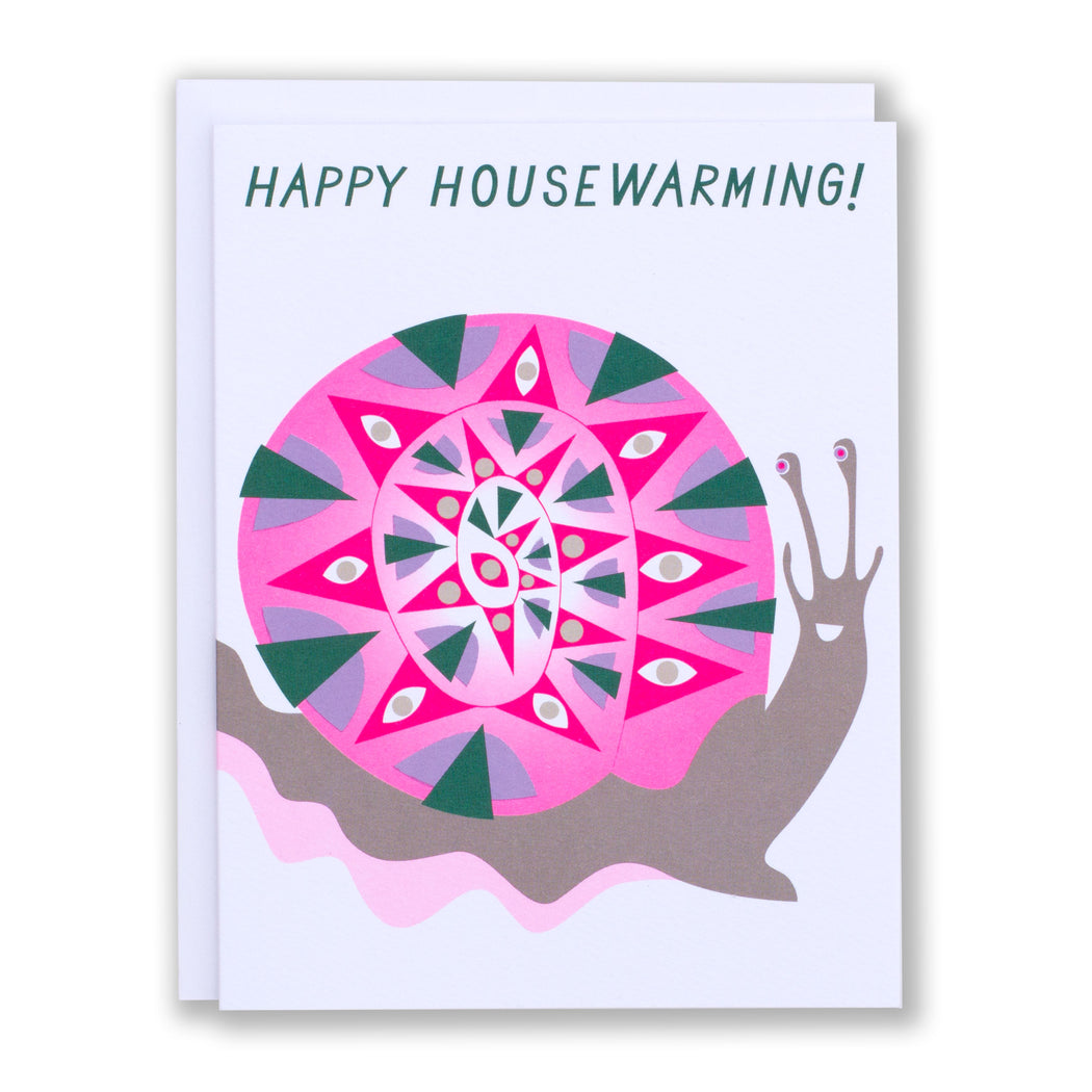 A neon pink snail on a Happy Housewarming card