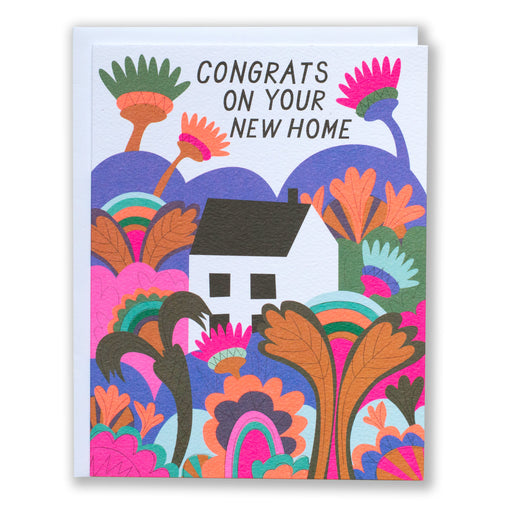 Housewarming card with an illustration of a tiny white house tucked in the middle of a psychedleic garden and the message Congrats on your new home