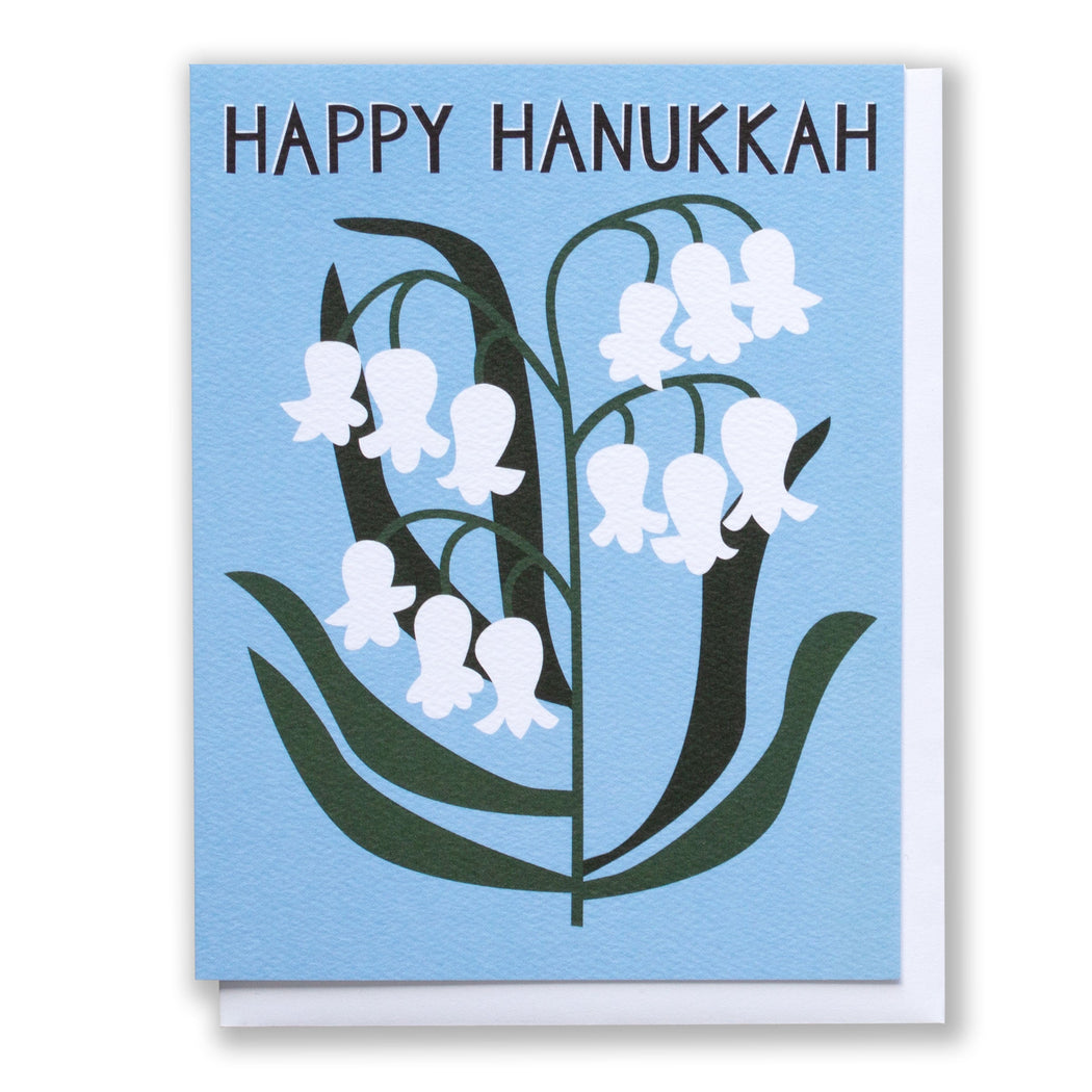 Note Card Happy Hanukkah drawing of lily of the valley flower on a blue background with Happy Hanukkah greeting