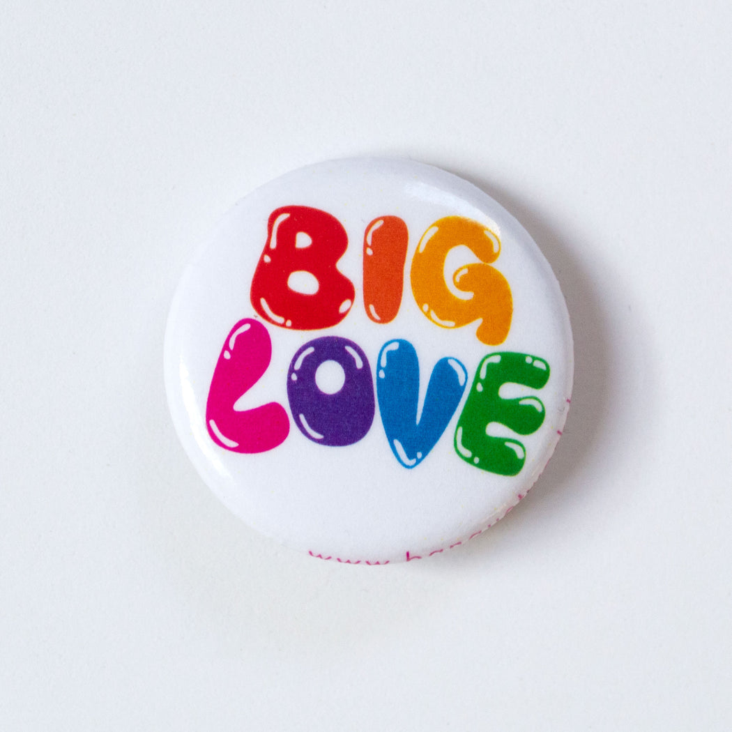 Big Love in bouncy rainbow bubble letters on a 1" button