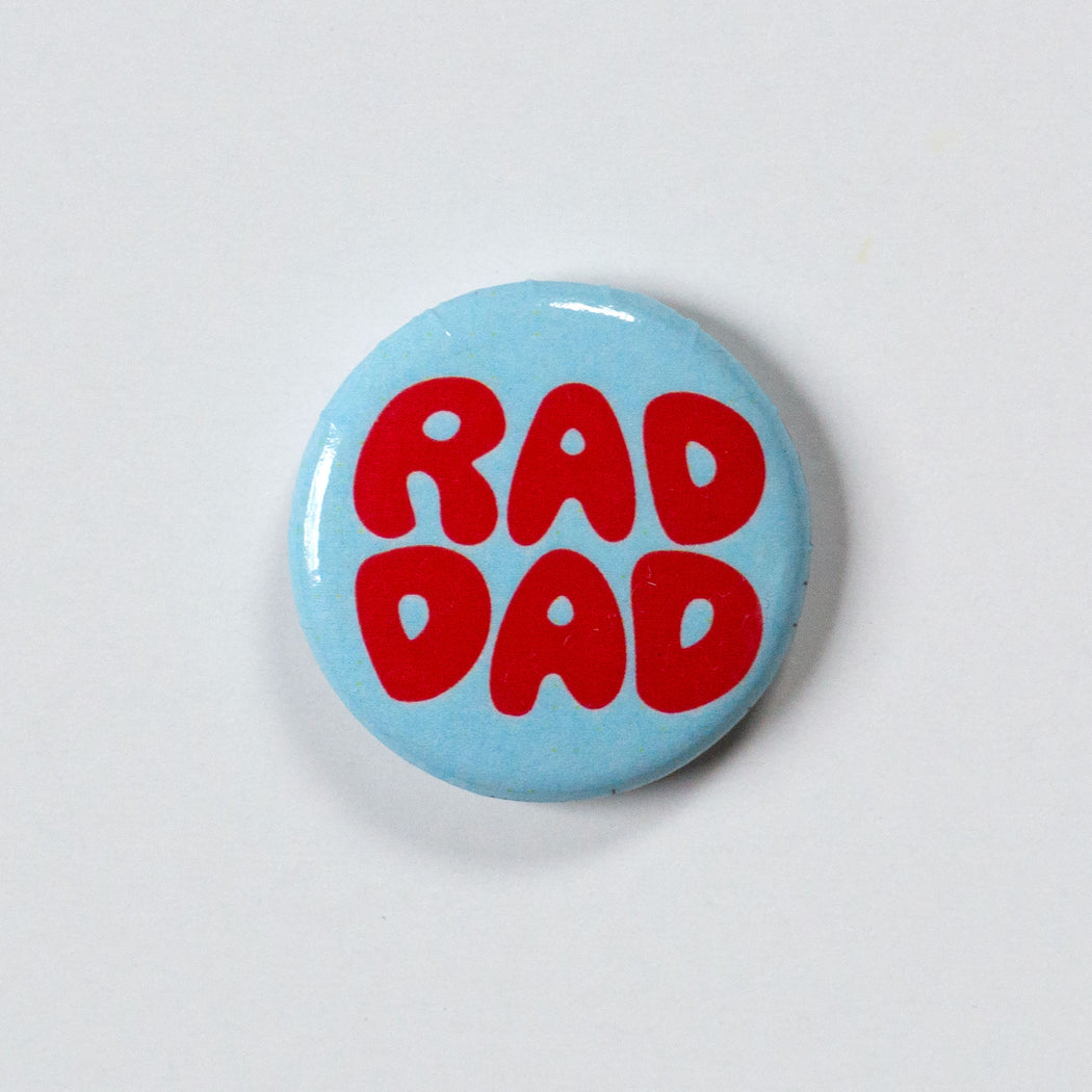 red rad dad on a turquoise one inch lapel pin