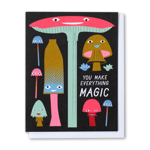 A special note card with a crowd of fungi with grinning faces and the greeting "You Make Everything Magic"