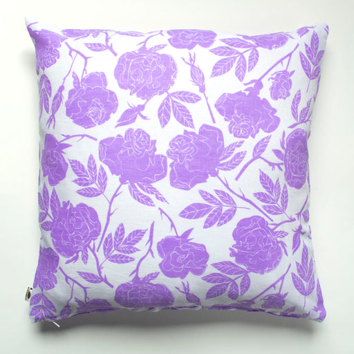 Square pillow screen printed with lavender hued rose stems